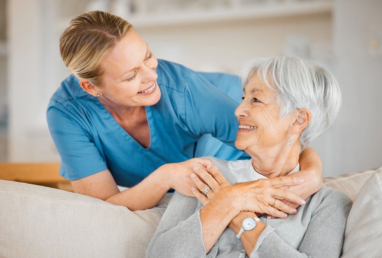 Caregiver providing compassionate assistance to a senior resident